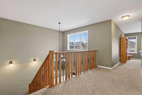 55 Sheep River Cove, Okotoks, AB - Indoor Photo Showing Other Room