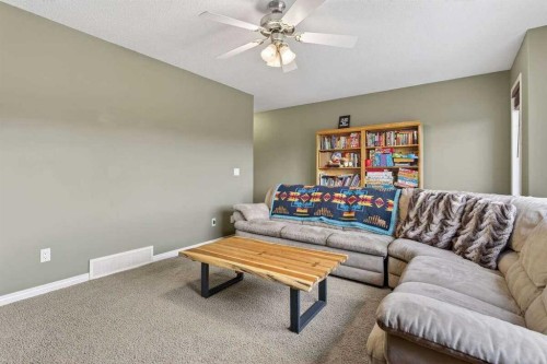 55 Sheep River Cove, Okotoks, AB - Indoor Photo Showing Other Room