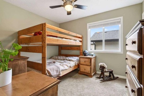 55 Sheep River Cove, Okotoks, AB - Indoor Photo Showing Bedroom