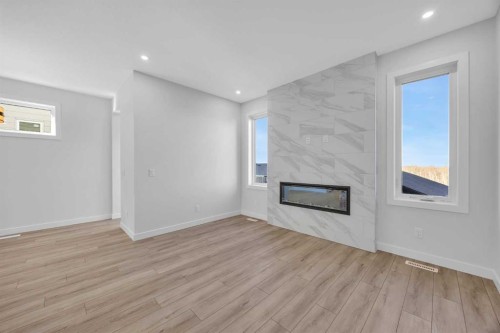 26 Versant Path Sw, Calgary, AB - Indoor With Fireplace
