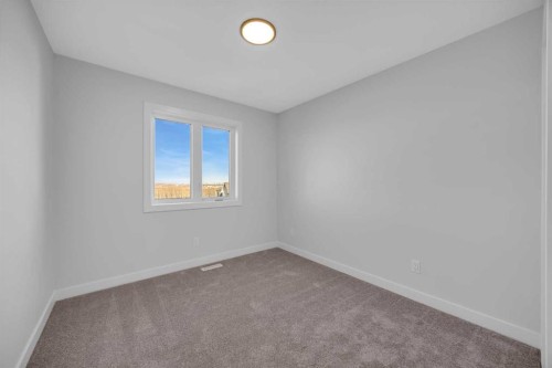 26 Versant Path Sw, Calgary, AB - Indoor Photo Showing Other Room