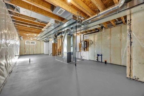 26 Versant Path Sw, Calgary, AB - Indoor Photo Showing Basement