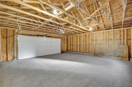 26 Versant Path Sw, Calgary, AB - Indoor Photo Showing Garage