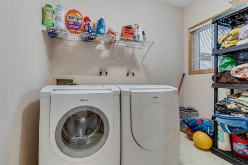399 Sunlake Road Se, Calgary, AB - Indoor Photo Showing Laundry Room