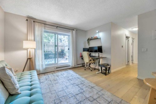103-222 5 Avenue Ne, Calgary, AB - Indoor Photo Showing Living Room