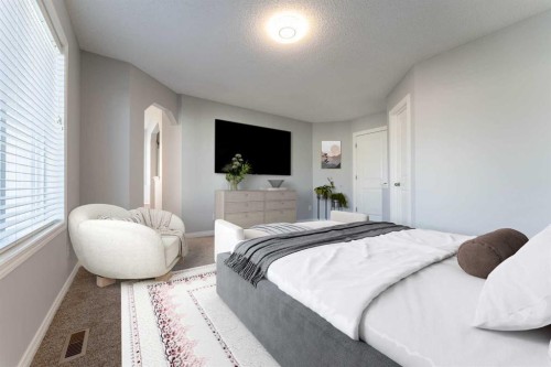 10 Everglen Crescent Sw, Calgary, AB - Indoor Photo Showing Bedroom