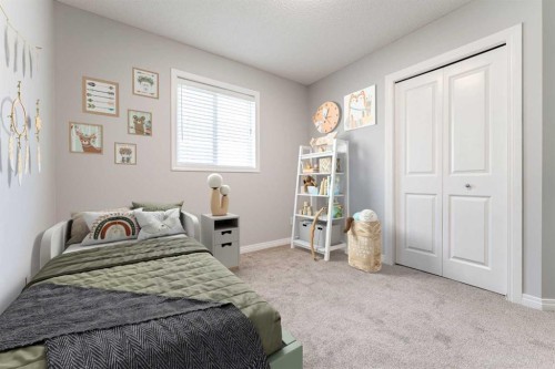 10 Everglen Crescent Sw, Calgary, AB - Indoor Photo Showing Bedroom