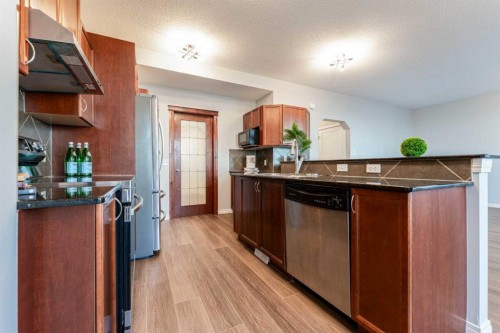 10 Everglen Crescent Sw, Calgary, AB - Indoor Photo Showing Kitchen With Double Sink