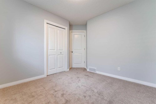 10 Everglen Crescent Sw, Calgary, AB - Indoor Photo Showing Other Room