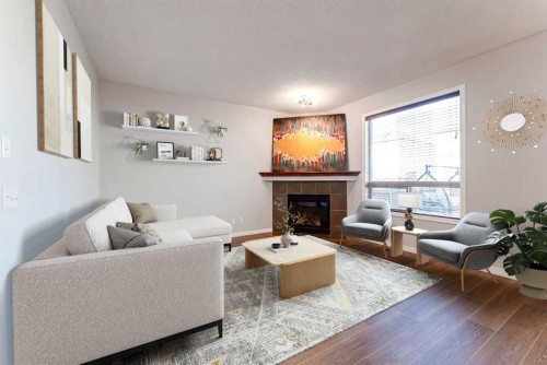 10 Everglen Crescent Sw, Calgary, AB - Indoor Photo Showing Living Room With Fireplace