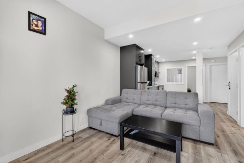 12 Cornerbrook Cove Ne, Calgary, AB - Indoor Photo Showing Living Room