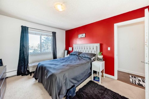 403-4455D Greenview Drive Ne, Calgary, AB - Indoor Photo Showing Bedroom