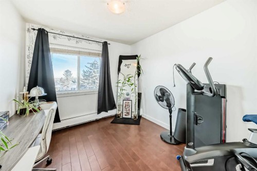 403-4455D Greenview Drive Ne, Calgary, AB - Indoor Photo Showing Gym Room