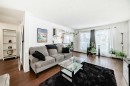 403-4455D Greenview Drive Ne, Calgary, AB  - Indoor Photo Showing Living Room 