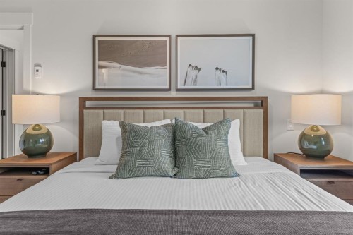 313-1408 Spring Creek Gate, Canmore, AB - Indoor Photo Showing Bedroom