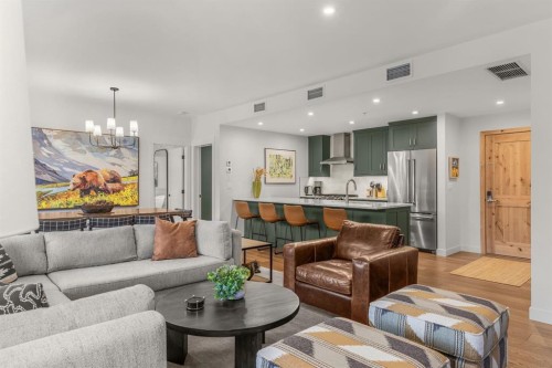313-1408 Spring Creek Gate, Canmore, AB - Indoor Photo Showing Living Room