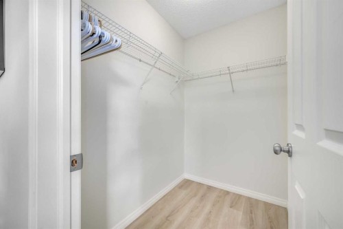 997 New Brighton Gardens Se, Calgary, AB - Indoor With Storage