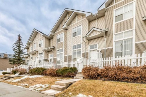 997 New Brighton Gardens Se, Calgary, AB - Outdoor With Facade