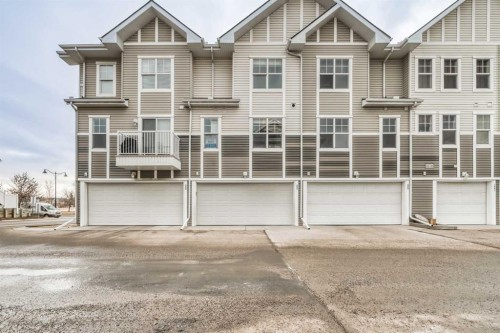 997 New Brighton Gardens Se, Calgary, AB - Outdoor With Facade