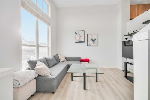 997 New Brighton Gardens Se, Calgary, AB - Indoor Photo Showing Living Room