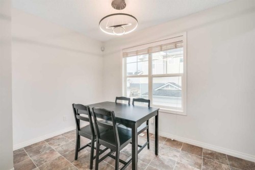 997 New Brighton Gardens Se, Calgary, AB - Indoor Photo Showing Dining Room