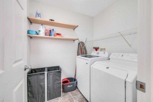 997 New Brighton Gardens Se, Calgary, AB - Indoor Photo Showing Laundry Room