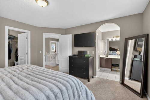 69 Elkton Way Sw, Calgary, AB - Indoor Photo Showing Bedroom