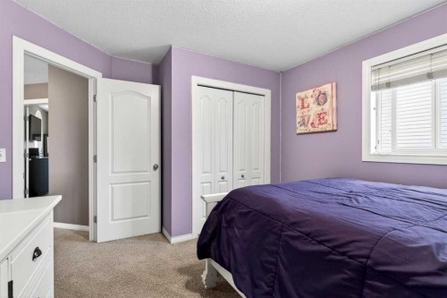 69 Elkton Way Sw, Calgary, AB - Indoor Photo Showing Bedroom
