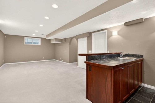 69 Elkton Way Sw, Calgary, AB - Indoor Photo Showing Basement