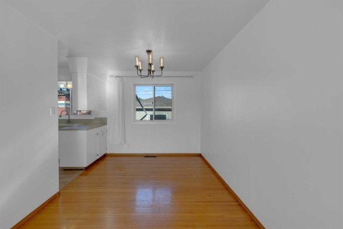 1980 Cottonwood Crescent Se, Calgary, AB - Indoor Photo Showing Other Room