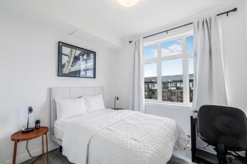 2401-200 Seton Circle Se, Calgary, AB - Indoor Photo Showing Bedroom