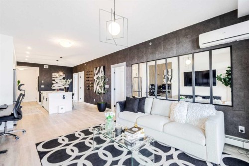 2401-200 Seton Circle Se, Calgary, AB - Indoor Photo Showing Living Room