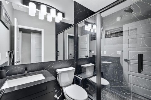 413 Belmont Park Sw, Calgary, AB 