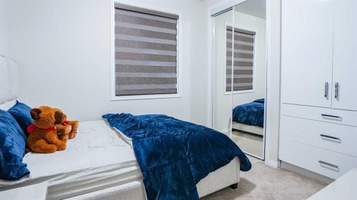 69 Carrington Way Nw, Calgary, AB - Indoor Photo Showing Bedroom