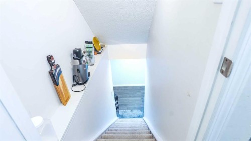 69 Carrington Way Nw, Calgary, AB - Indoor Photo Showing Other Room