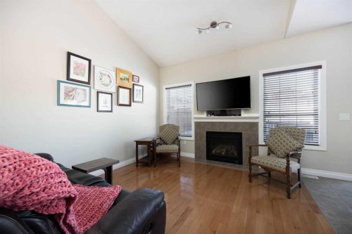 140 Heron Place, Fort Mcmurray, AB - Indoor Photo Showing Living Room With Fireplace