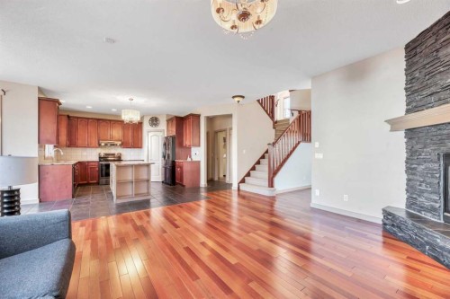 63 Discovery Ridge Circle Sw, Calgary, AB - Indoor Photo Showing Living Room With Fireplace