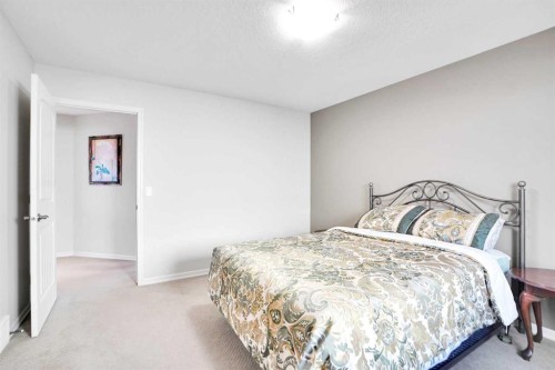 60 Cranarch Rise Se, Calgary, AB - Indoor Photo Showing Bedroom