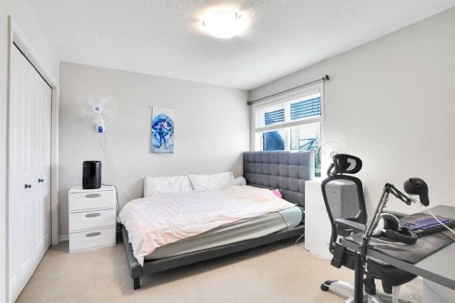 60 Cranarch Rise Se, Calgary, AB - Indoor Photo Showing Bedroom