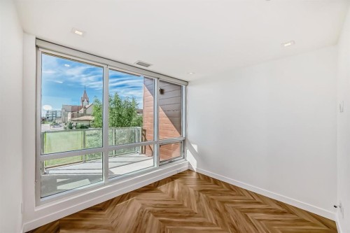 112-8445 Broadcast Avenue Sw, Calgary, AB - Indoor Photo Showing Other Room