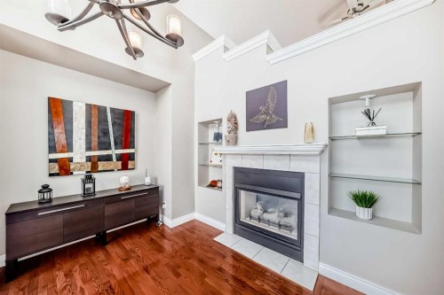 188 Hidden Ranch Crescent Nw, Calgary, AB - Indoor With Fireplace