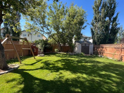 188 Hidden Ranch Crescent Nw, Calgary, AB - Outdoor With Backyard