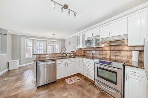 188 Hidden Ranch Crescent Nw, Calgary, AB - Indoor Photo Showing Kitchen With Upgraded Kitchen