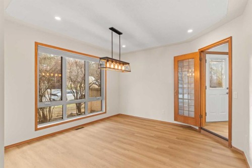 15 Patterson Drive Sw, Calgary, AB - Indoor Photo Showing Other Room