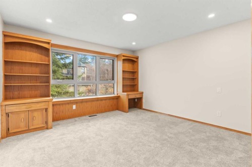 15 Patterson Drive Sw, Calgary, AB - Indoor Photo Showing Other Room