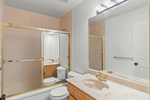 15 Patterson Drive Sw, Calgary, AB - Indoor Photo Showing Bathroom