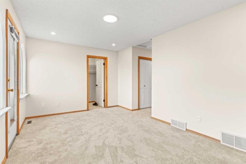 15 Patterson Drive Sw, Calgary, AB - Indoor Photo Showing Other Room