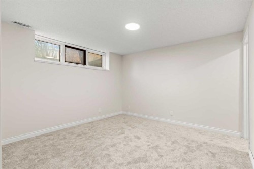 15 Patterson Drive Sw, Calgary, AB - Indoor Photo Showing Other Room