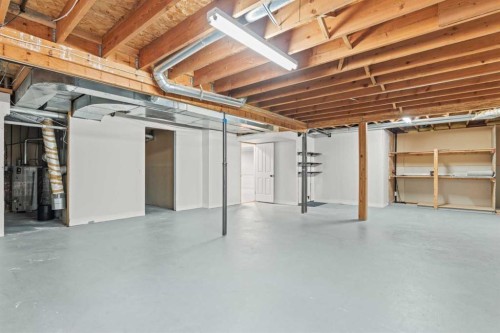 15 Patterson Drive Sw, Calgary, AB - Indoor Photo Showing Basement
