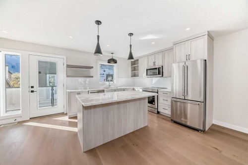 115-1330 1St Avenue, Canmore, AB - Indoor Photo Showing Kitchen With Upgraded Kitchen